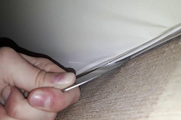 Демонтаж натяжного потолка